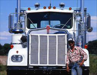 driver standing in front of a truck